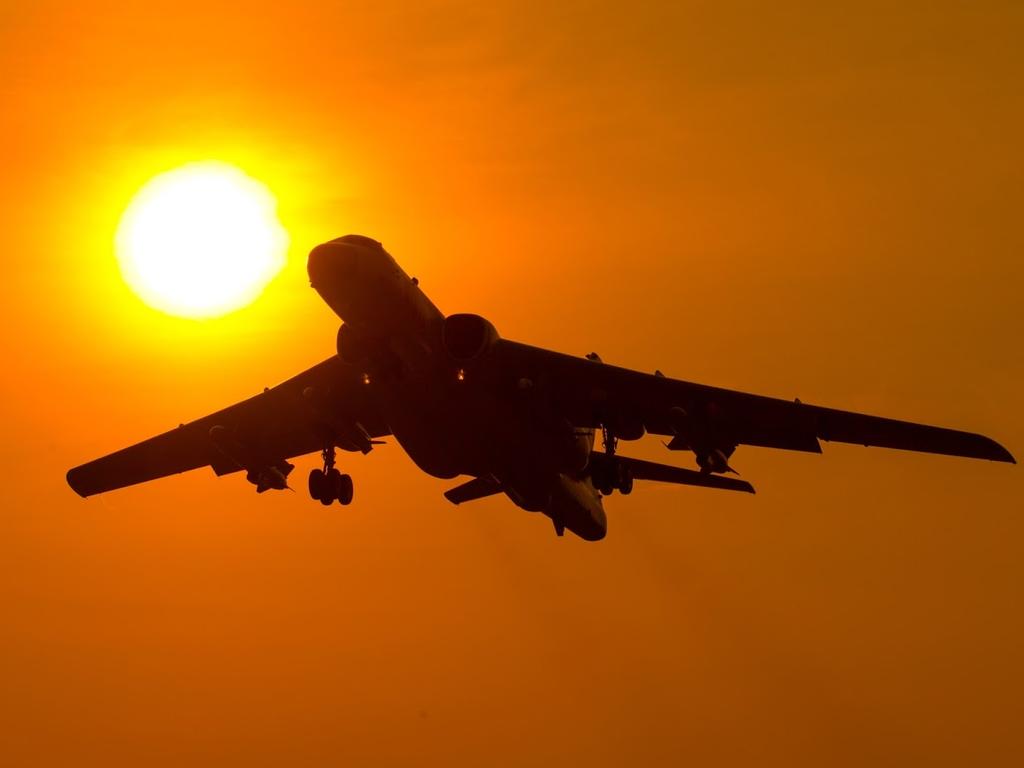 A Chinese H6K takes off into a golden dawn. Beijing has been proudly boasting of its position as a new world power. Picture: Xinhua