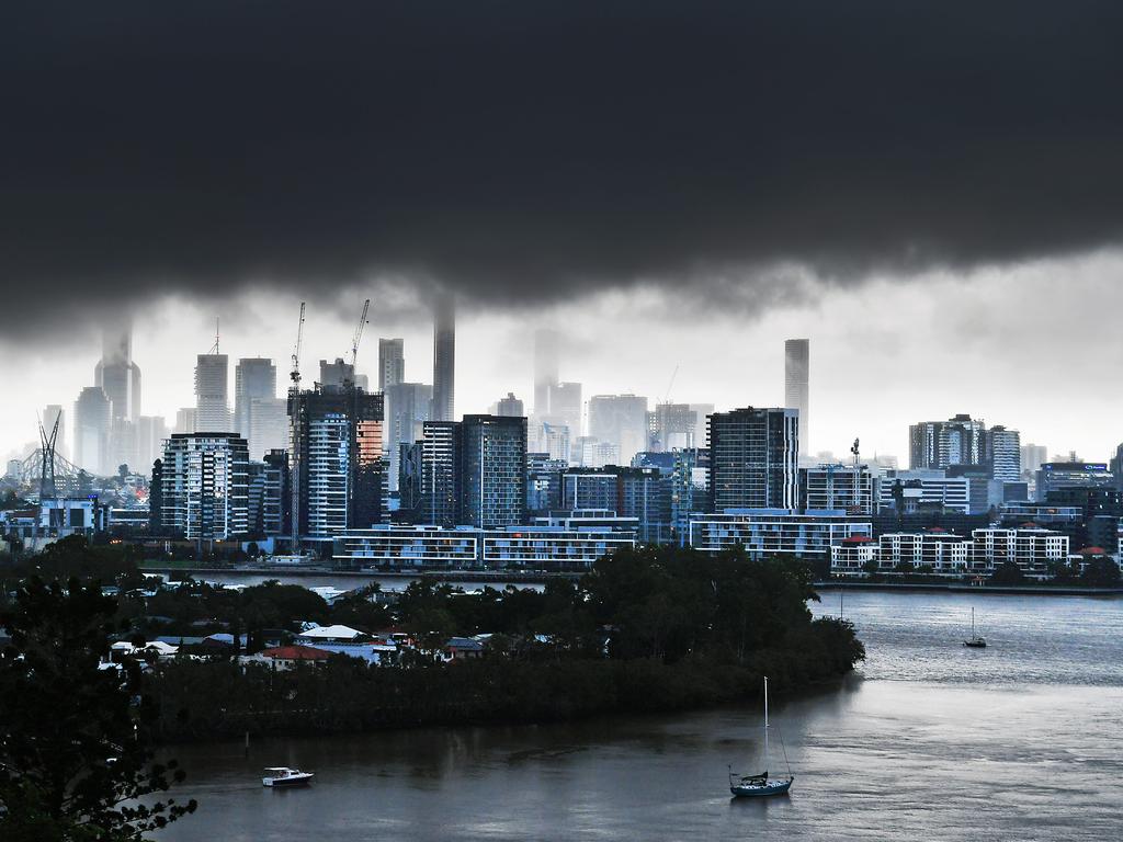 Stormclouds loom over Brisbane yesterday. Picture: John Gass