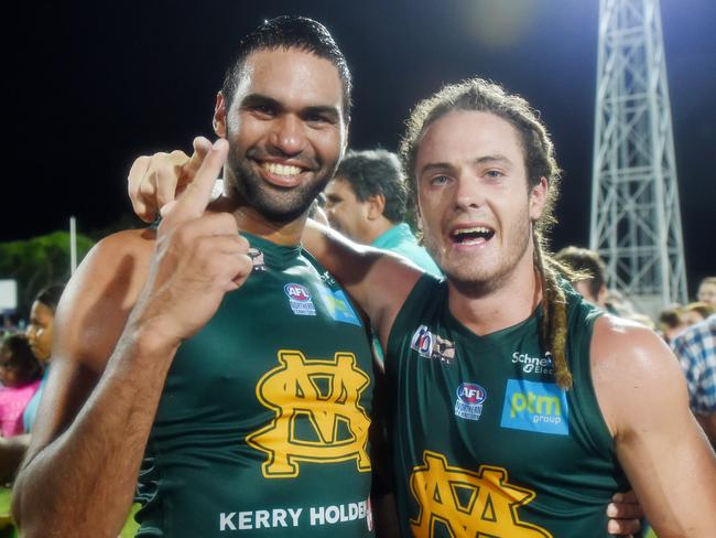 St Mary’s stars Raphael Clarke and Jackson Geary celebrate after winning the 2015-16 NTFL Grand Final. Picture: Elise Derwin