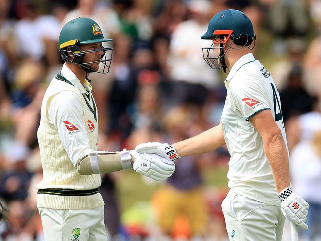 Cameron Green celebrates 150 runs with Josh Hazlewood. Picture: AFP