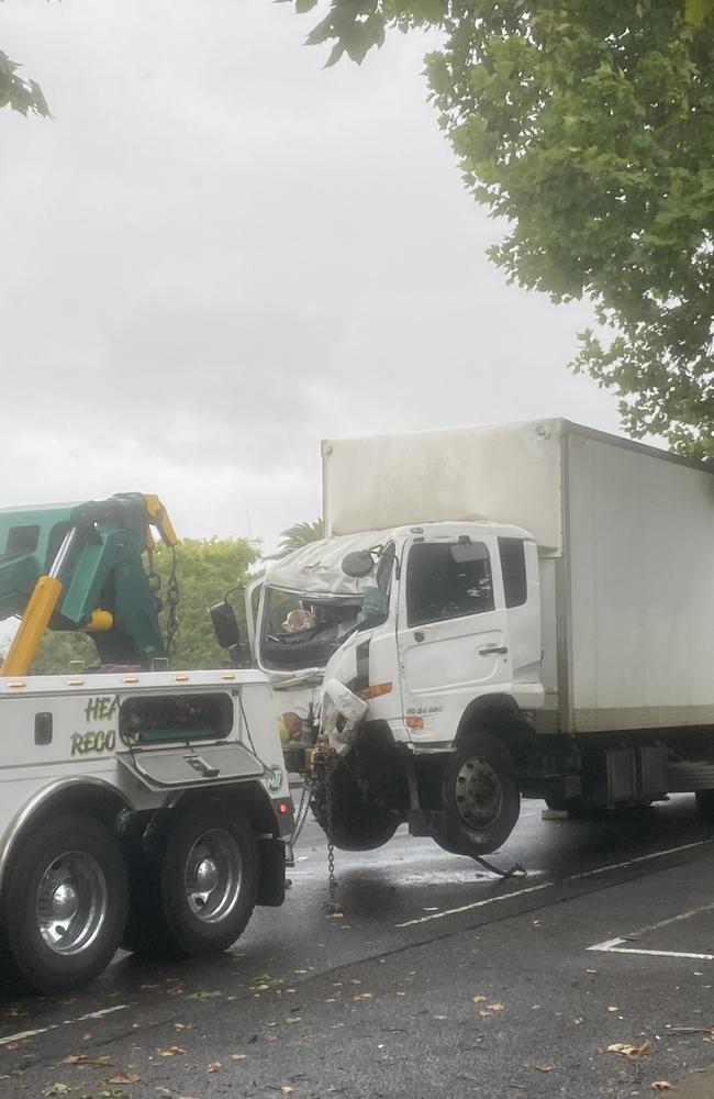 The truck is towed away after the crash. Picture: Amelia Swan