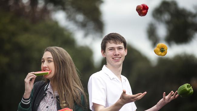 Melba College VCE year 12 students Rebekah Wynne, 18, and Matt Pike, 18, tuck into healthy foods. Picture: Sarah Matray