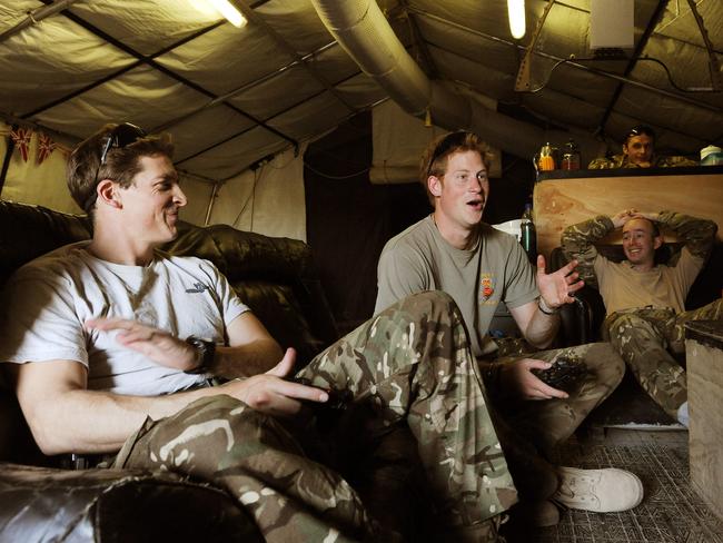 Fun and games ... Prince Harry playing a computer football game with his fellow Apache Helicopter Pilot Capt Simon Beattie during their shift at the British controlled flight-line in Camp Bastion, Afghanistan in 2012. Pic: WPA Pool/Getty Images