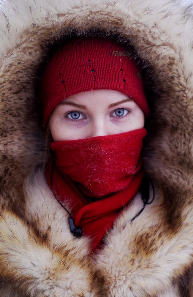 A young student poses for a portrait at a bus station in Yakutsk Village of Oymyakon. Picture: Amos Chapple/REX/Shutterstock/Australscope