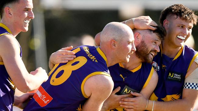 Lachlan Johns of Vermont Eagles is congratulated by teammates after kicking a goal during the 2023 Eastern Football Netball League Premier Division grand final. The team won their first game this season on Saturday. Photo by Josh Chadwick