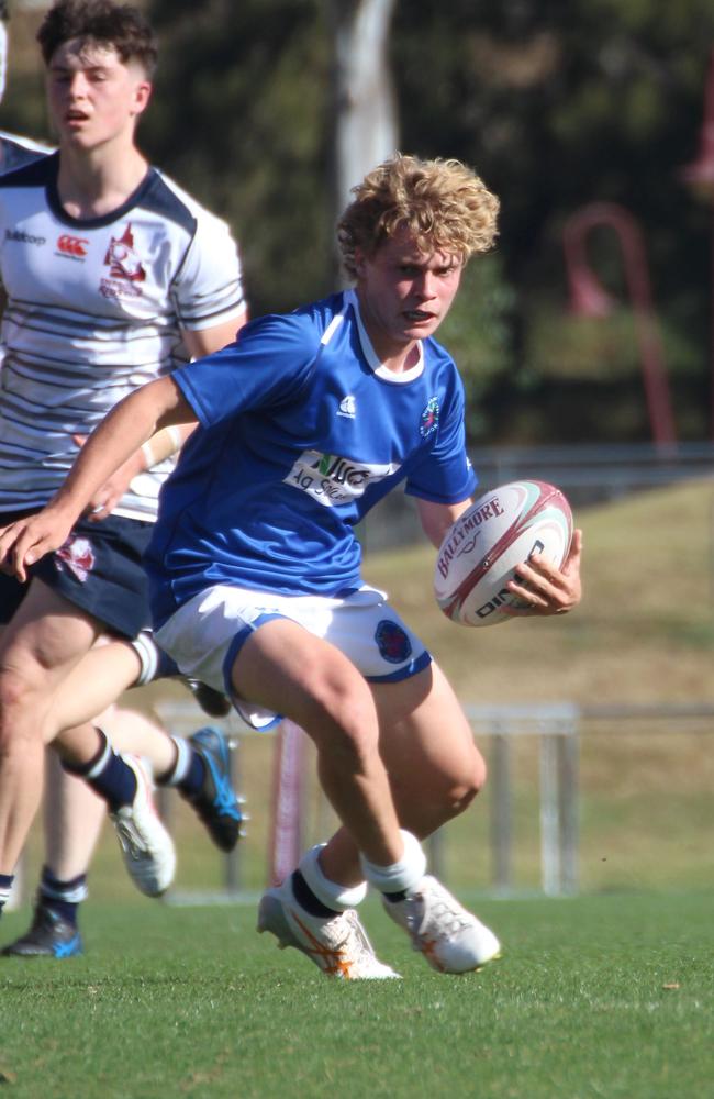 Myles Rosemond runs the ball for Queensland Country at the 2023 ERC.