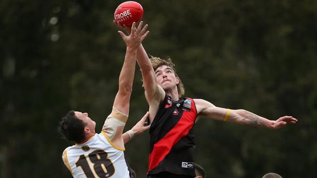 Finnbar Maley contests the ruck against Jarryd Coulson. Picture: Hamish Blair