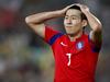 South Korea's Son Heung Min reacts after missing a goal shot during the AFC Asian Cup semifinal soccer match between South Korea and Iraq in Sydney, Australia, Monday, Jan. 26, 2015. (AP Photo/Quentin Jones)