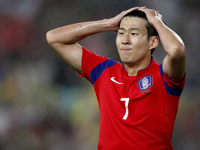 South Korea's Son Heung Min reacts after missing a goal shot during the AFC Asian Cup semifinal soccer match between South Korea and Iraq in Sydney, Australia, Monday, Jan. 26, 2015. (AP Photo/Quentin Jones)