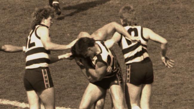 There’s plenty going on here between Robert DiPierdomenico, Andrew Bews, Neville Bruns and Garry Hocking.