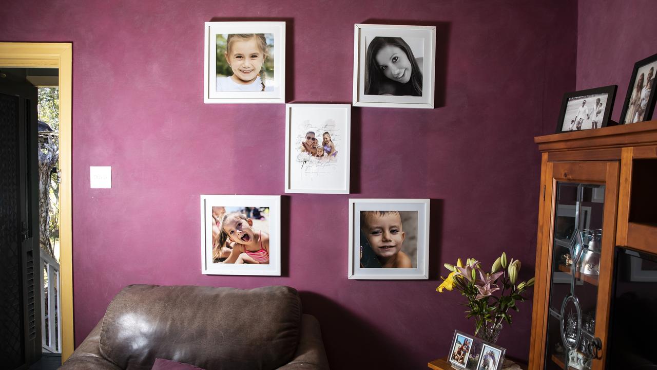 Pictures of Hannah and her three children on the wall at the Clarke’s family home. Picture: Mark Cranitch