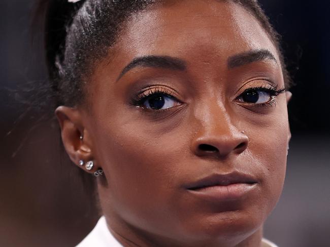 TOKYO, JAPAN - JULY 27: Simone Biles of Team United States looks on during the Women's Team Final on day four of the Tokyo 2020 Olympic Games at Ariake Gymnastics Centre on July 27, 2021 in Tokyo, Japan. (Photo by Laurence Griffiths/Getty Images)