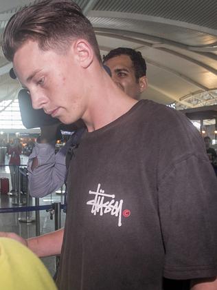 Jamie Murphy at Bali International airport about to leave for Perth. Picture: AAP Image/Johannes Christo.