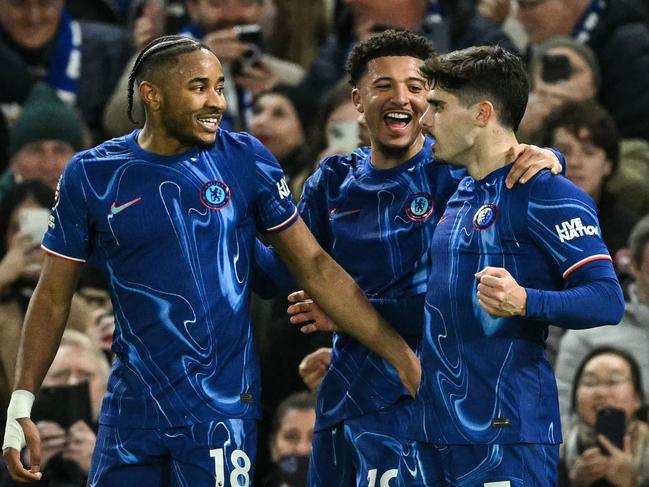 Pedro Neto celebrates with teammates after scoring Chelsea’s second goal. Picture: AFP