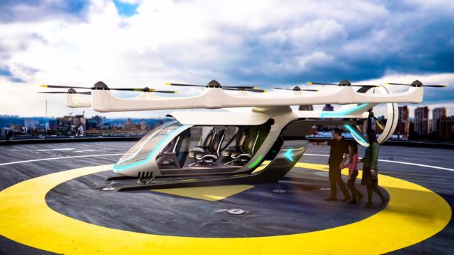 An artist impression of an UberAir drone on a landing pad.