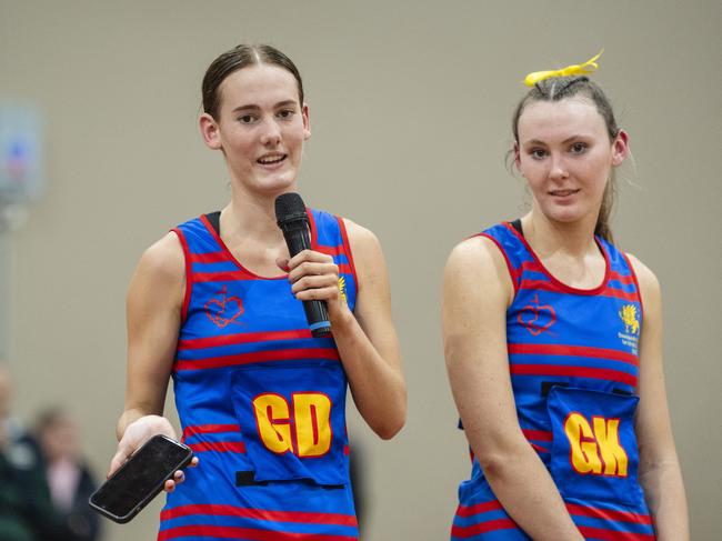 Molly Gore (left) and Emily Stapleton after the First VII team defeated St Ursula's Senior A to claim the Merici-Chevalier Cup at Downlands College, Friday, July 14, 2023. Picture: Kevin Farmer