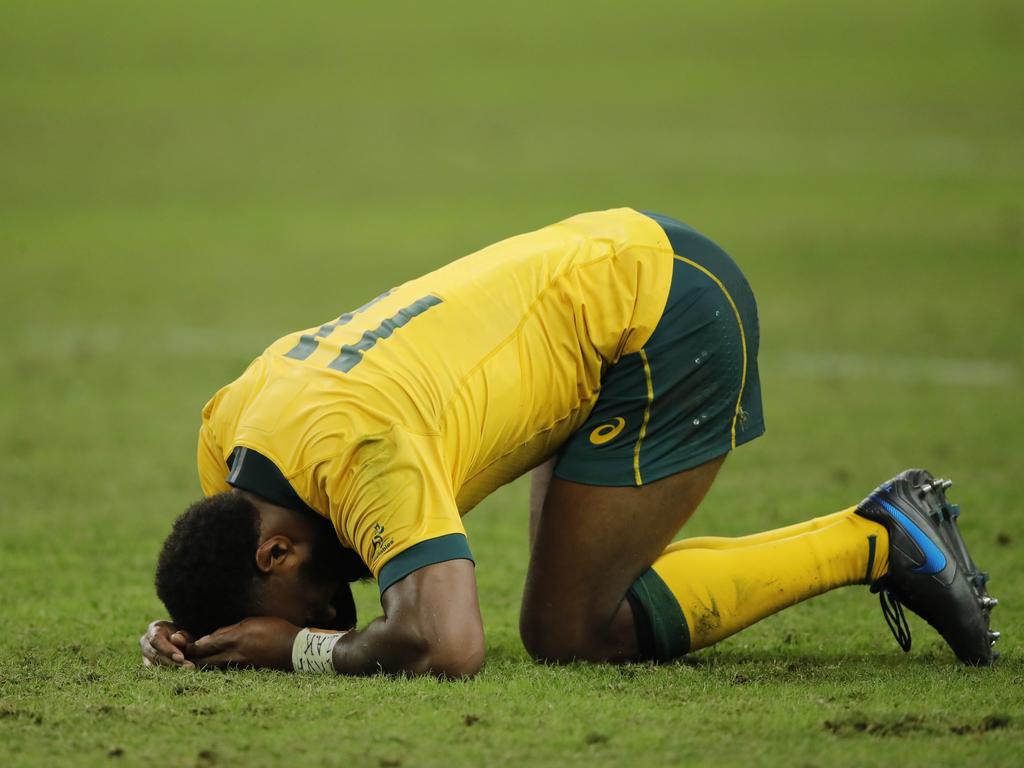 Australia's Marika Koroibete reacts after the 40-16 loss to England. (AP Photo/Christophe Ena)