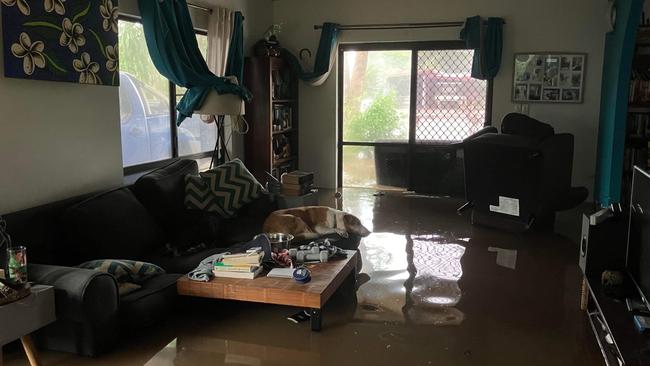 Floodwaters inundated homes at Holloways Beach, just north of Cairns city. Picture: Daniel Bateman.