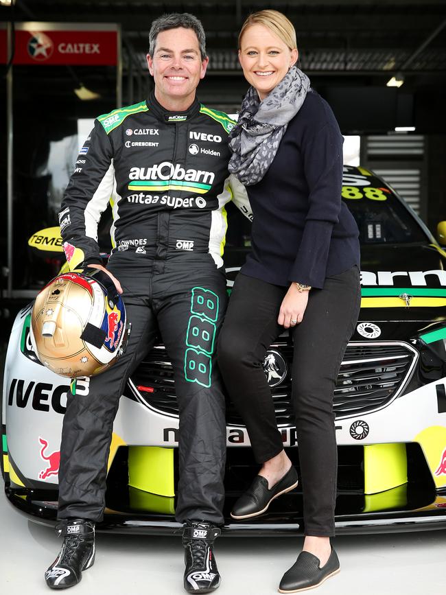 Craig Lowndes with his wife Lara at the Mount Panorama Racing Circuit in Bathurst. Picture: Tim Hunter