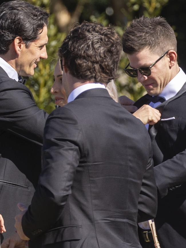 Best friend, comedian Andy Lee helps Tim Paine with his suit. Picture: WP/ MEDIA-MODE