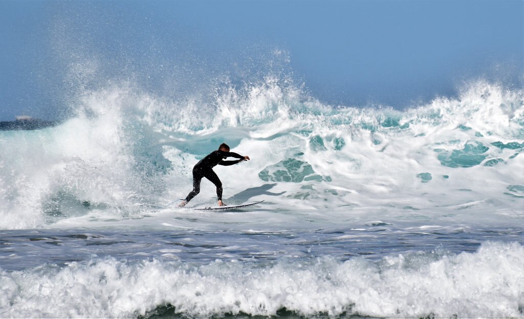 Surfers and bodyboard riders making the most of the waves at Kawana on the weekend. Picture: Mark Furler