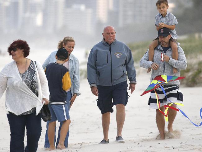 Adam Wittington with his wife Karin &amp; sons Ty &amp; Neilson and Adam’s mother Georgina on the beach in Brisbane as they film an interview for Sunday Night. Picture: Nathan Richter/INFphoto