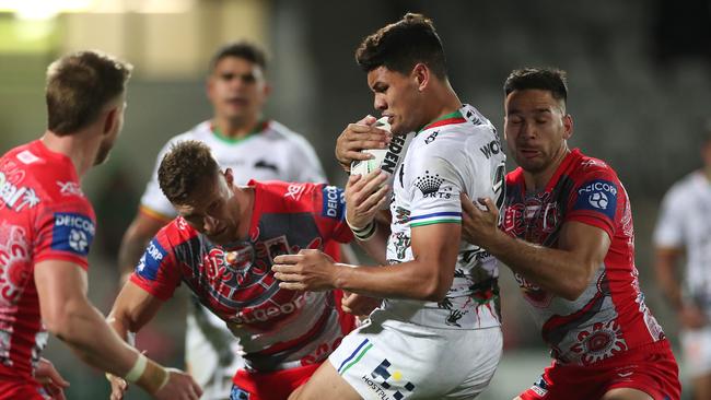 Jaxson Paulo of the Rabbitohs is tackled during the round 12 NRL match between the St George Illawarra Dragons and the South Sydney Rabbitohs at Netstrata Jubilee Stadium.