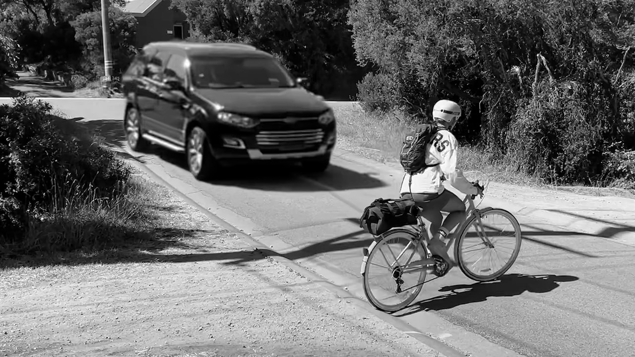 Re-enactment of Daniel and Catherine Andrews' crash with cyclist Ryan Meuleman