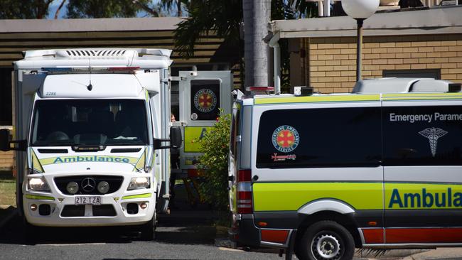 Ambulances queue outside of North Rockhampton Nursing Centre as patients were transferred.