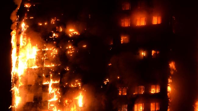 This handout image received by local resident Giulio Thuburn early on June 14, 2017 shows flames engulfing a 27-storey block of flats in west London. The fire brigade said 40 fire engines and 200 firefighters had been called to the blaze in Grenfell Tower, which has 120 flats. / AFP PHOTO / Giulio Thuburn / Giulio Thuburn / -----EDITORS NOTE --- RESTRICTED TO EDITORIAL USE - MANDATORY CREDIT "AFP PHOTO / Giulio Thuburn" - NO MARKETING - NO ADVERTISING CAMPAIGNS - DISTRIBUTED AS A SERVICE TO CLIENTS - NO ARCHIVES