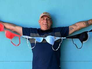 Rob Bauer with a string of bras. Picture: Mike Knott BUN150819BRA1