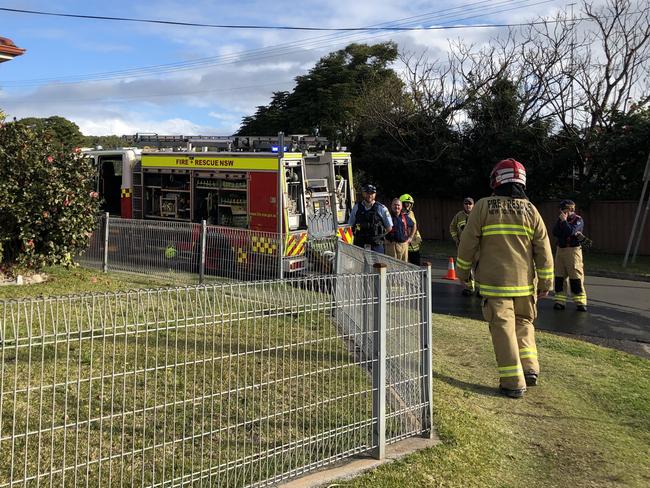 Emergency service crews attending the scene. Picture: Madeline Crittenden