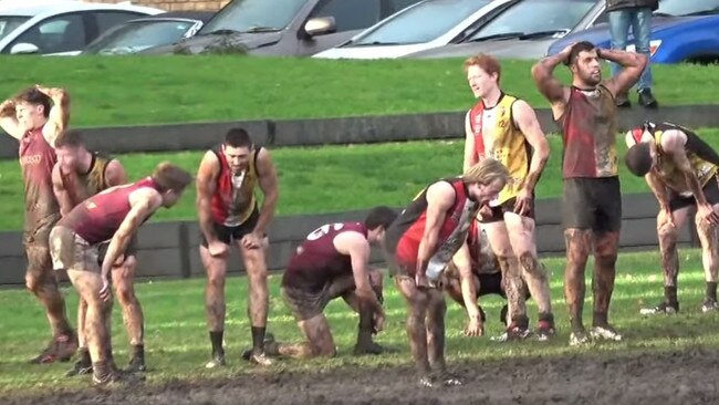 Goodwood and Prince Alfred OC players react to the final siren of their thrilling draw. Picture: Filming Footy