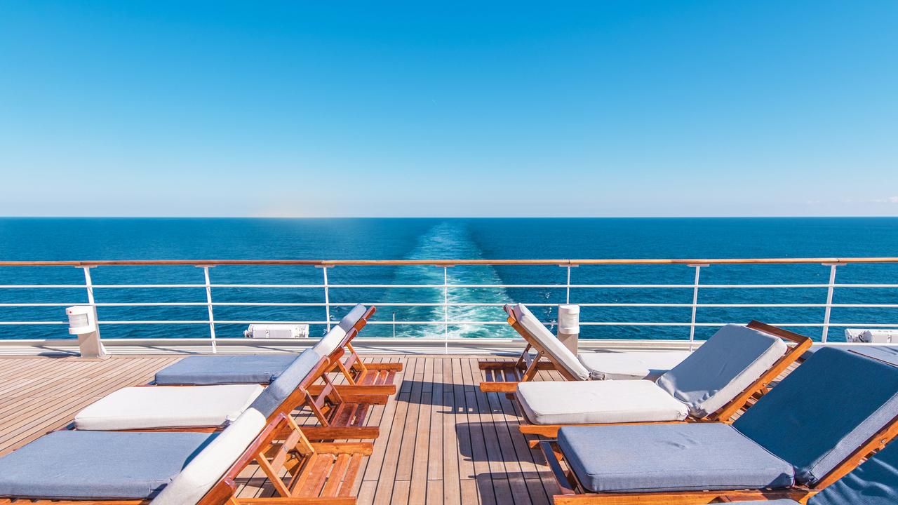 Cruise Ship Vacation. Sea Travel Concept with Deckchairs on the Vessel Deck.