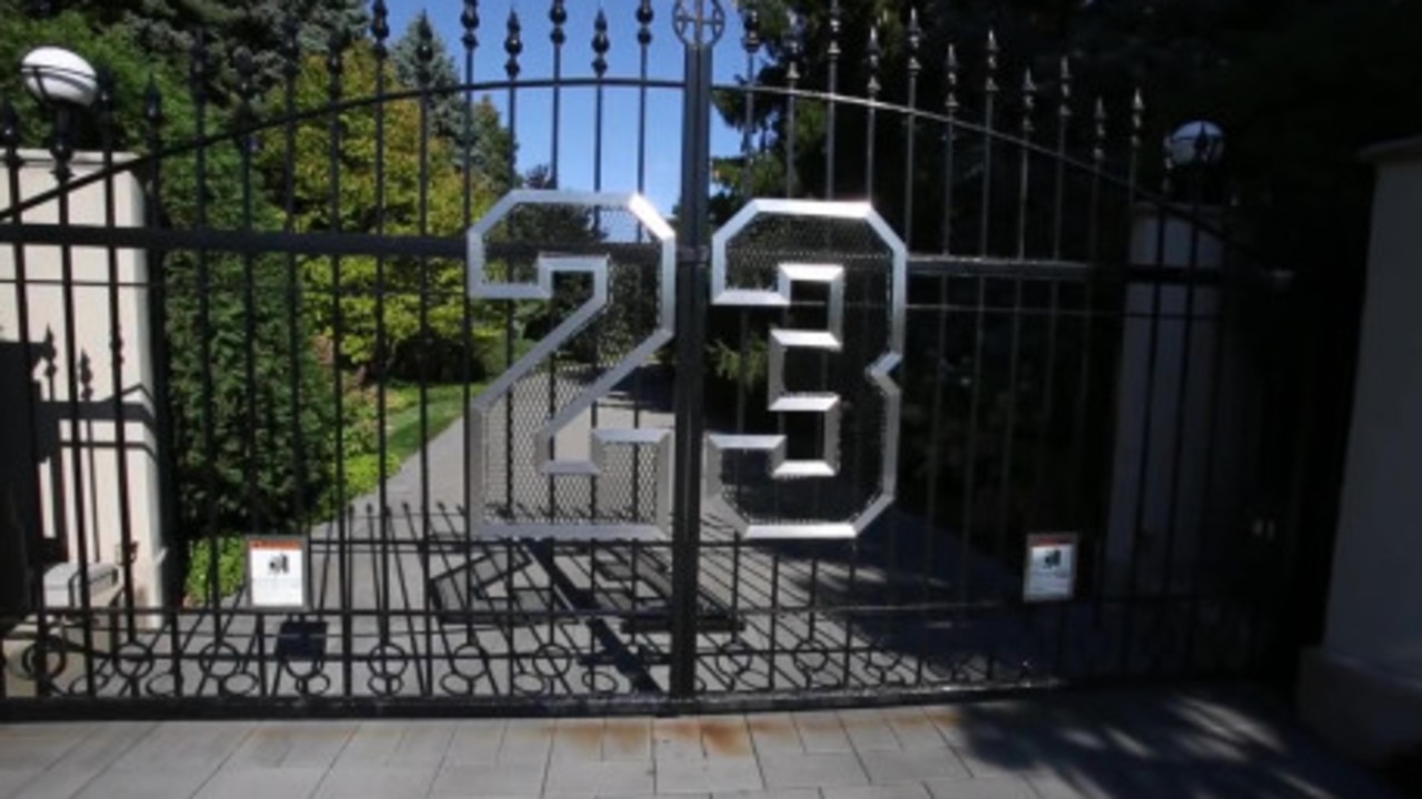 Jordan's front gate is adroned by his famous number 23.