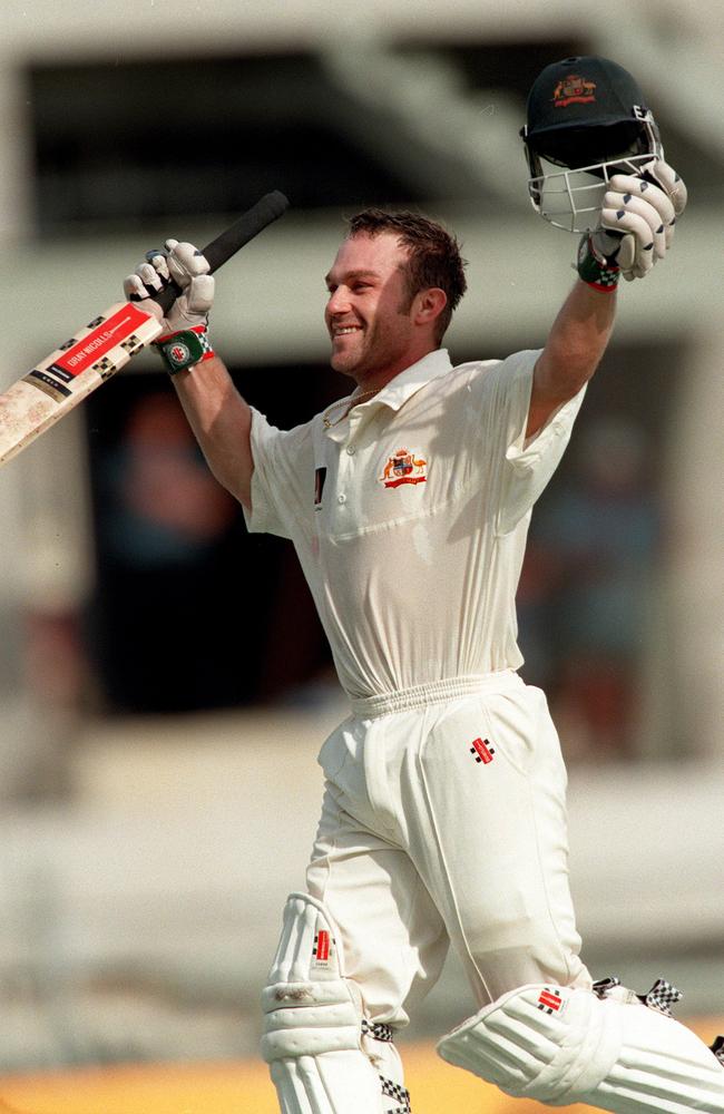 Slater after scoring a century in at the Gabba in 1998.