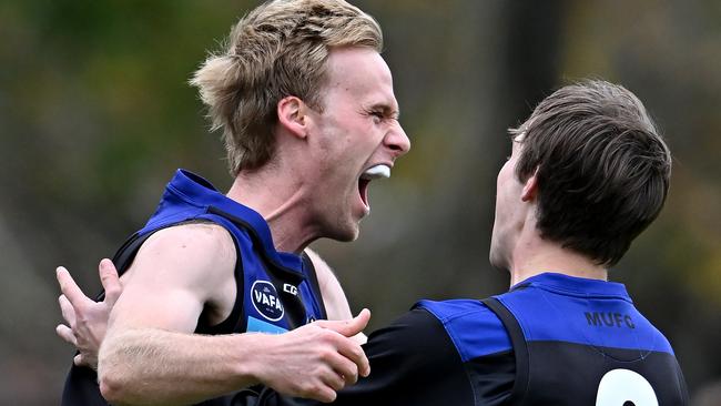 VAFA: Uni Blacks’ Darren Mumford and Austin Steere celebrate a goal. Picture: Andy Brownbill