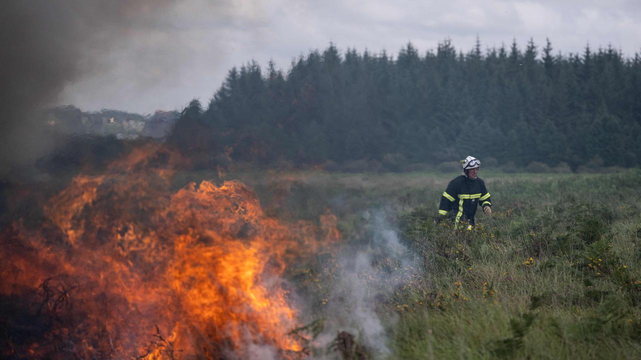 Firefighters spent yesterday dealing with wildfires across Western Europea. (Photo by LOIC VENANCE / AFP)