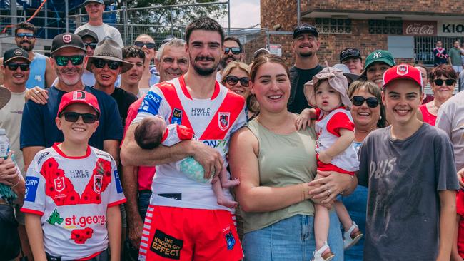 Cody Ramsey holding daughter Ella with partner Tahlia and eldest daughter Mia at Henson Park. Pic: Morgan Taylor Dragons Digital