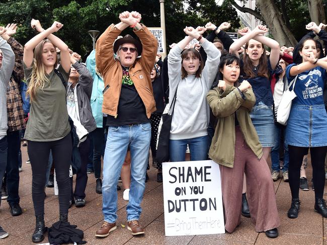 Protesters cross their arms at Hyde Park after marching through the streets of the CBD in Sydney. Picture: Troy Snook/News Corp Australia