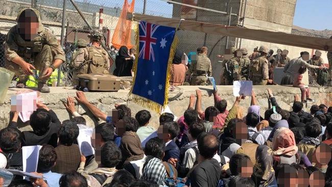 The Kabul airport was flooded with Afghans trying to flee the country before Australian and coalition forces withdrew at the end of August.