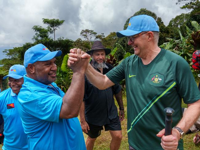 PAPUA NEW GUINEA: Newswire Photos: APRIL 24 2024: Australia's Prime Minister Anthony Albanese and Papua New Guinea Prime Minister James Marape walk along the Kokoda Track at Kokoda Village in Papua New Guinea on April 24, 2024. Prime Minister Anthony Albanese slips over. Picture: NCA NewsWire via the Australian Prime Ministers Office