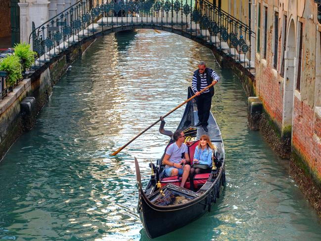 ESCAPE:  Venice, Italy - October 23, 2018: Gondolas on Canal Rio de l'Alboro Picture: Istock