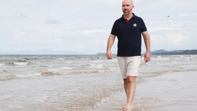 Mayfair 101 managing director James Mawhinney at Mission Beach in 2022 with Dunk Island in the background. Picture: Peter Carruthers