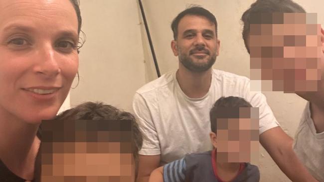 NETWORK ONLY (NOTE CHILDRENS FACES BLURRED) Emily Gian, 41, is an Australian living in Yehud, near Israel's Ben Gurion International Airport with her husband Tomer and their three children, aged 11, 9 and 5. This is an image of the family in their bunker. Supplied