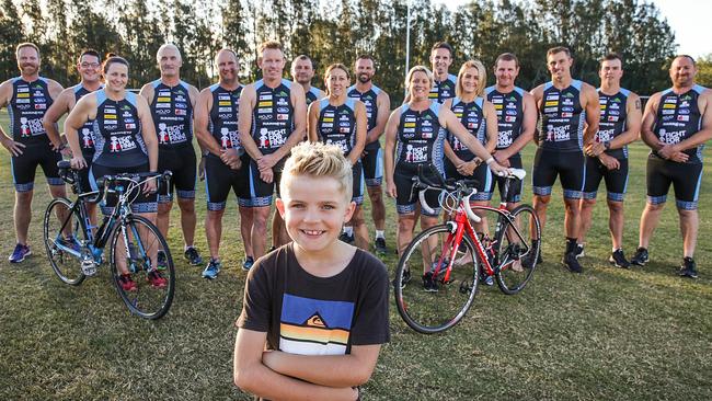 Finn O’Donovan with family and friends who will competing in the Port Macquarie Ironman. Picture: Carmela Roche