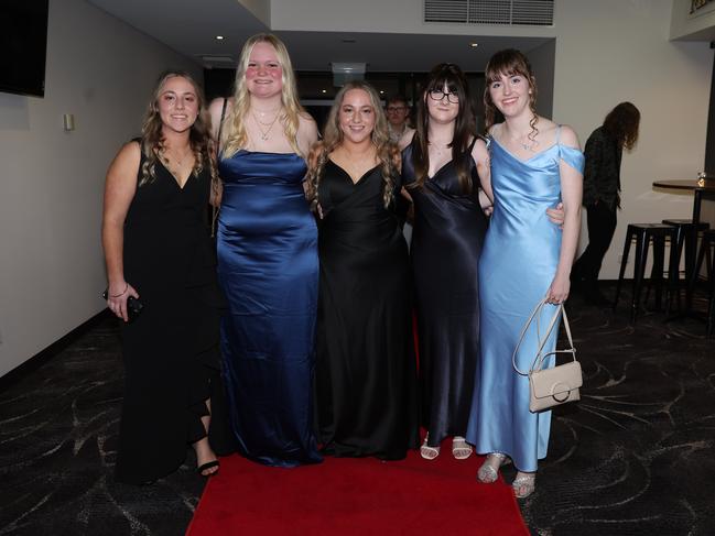 MELBOURNE, AUSTRALIA – JUNE 14 2024 Grace Murray, Shayla Buckton, Mayce Murray, Elise Gibbs and Shavonne Beecher attend the Lowanna College Senior Formal 2024 at the Moe Racing Club Picture: Brendan Beckett