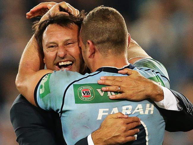 NSW's coach Laurie Daley celebrates victory with NSW's Robbie Farah after Game 2 of the 2014 State of Origin series at ANZ Stadium, Sydney. Pic Brett Costello