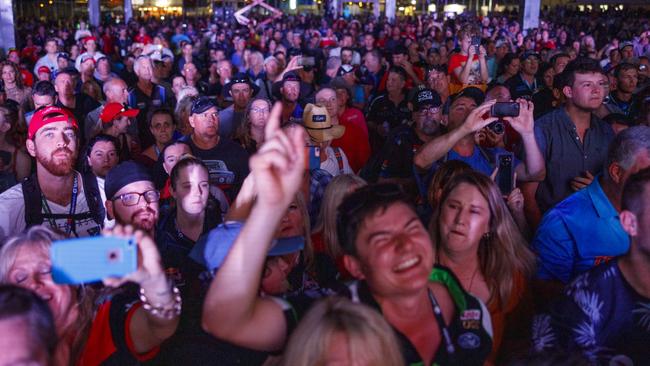 Fans dancing to music in the big top precinct at the 2018 Supercars event.