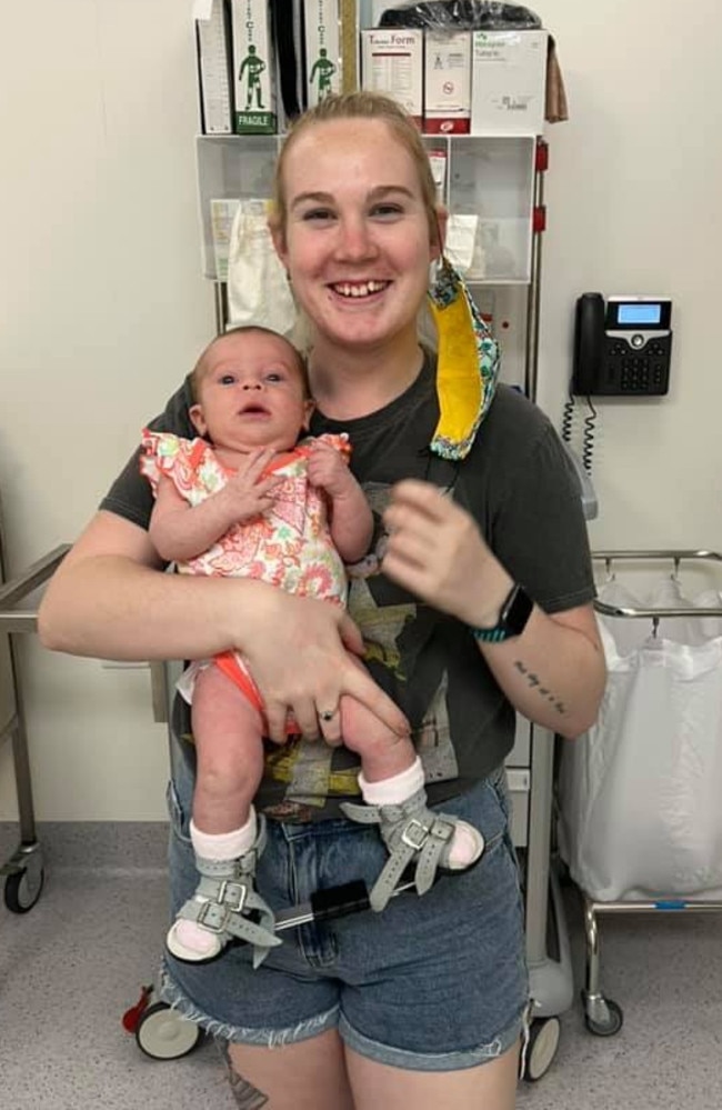 Stella receiving her boots and bar with her mum, Hayley Ferguson. Photo: contributed.